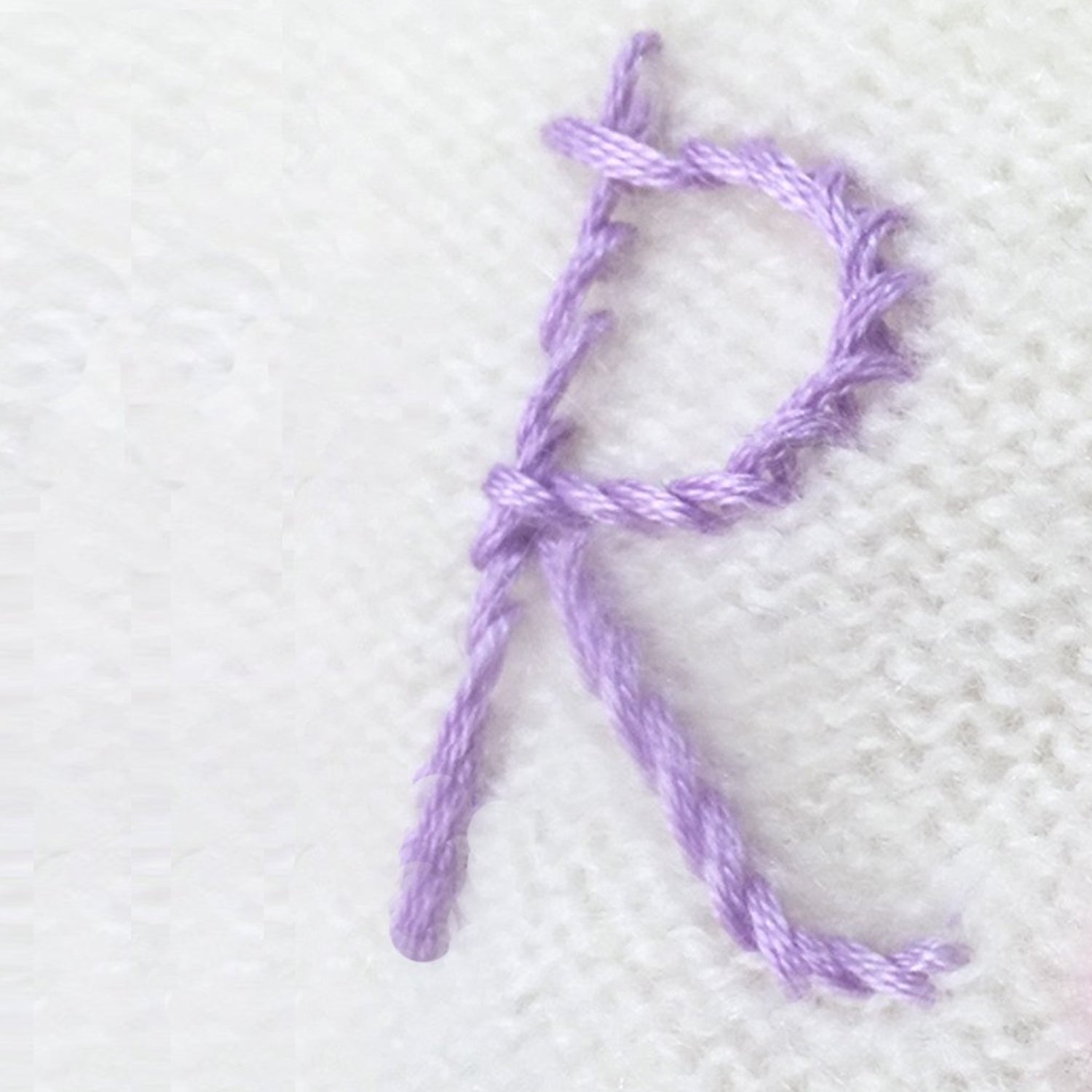 embroidered initial